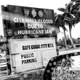 A black-and-white photo of a sign outside a mall in Cape Coral, Florida.