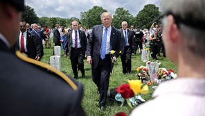 Donald Trump greets families of the fallen at Arlington National Cemetery on Memorial Day 2017.