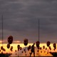 A man walks past masks in Brasilia. 