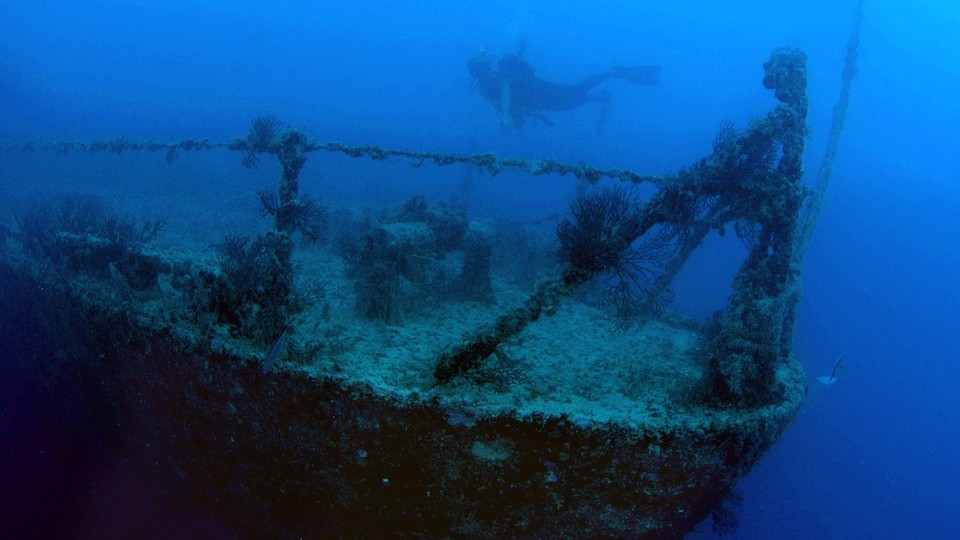 A diver swims at the shipwreck of Spiegel Grove, in the Florida Keys National Marine Sanctuary.