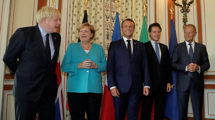 Boris Johnson stands alongside Germany's Angela Merkel, France's Emmanuel Macron, Italy's Giuseppe Conte and the European Council's Donald Tusk.