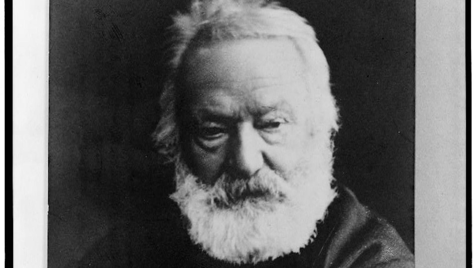 A black and white photograph of Victor Hugo
