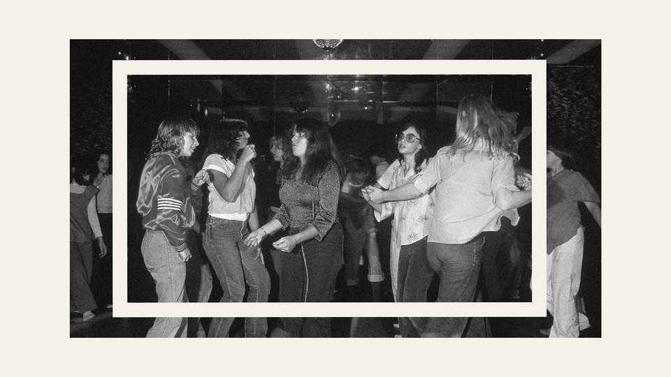 A group of teens dancing together