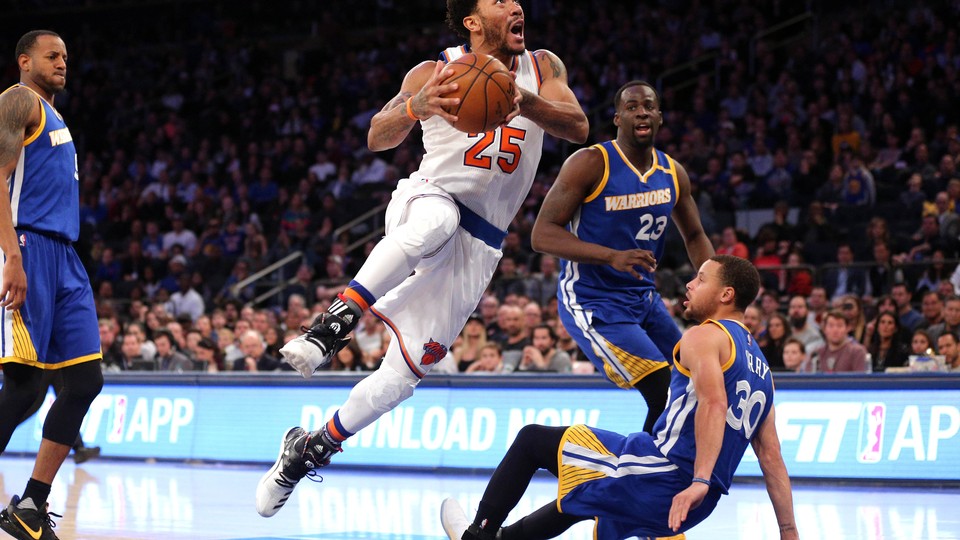Derrick Rose (25), a point guard for the New York Knicks, drives against Stephen Curry (30) and Draymond Green (23) of the Golden State Warriors on March 5.