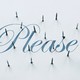 The word "please" in cursive script on a white background, pierced by nails poking through