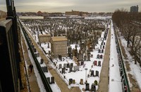 A photo of a snow-covered cemetery in New York City