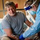 A nurse and a COVID-19 patient UAMS​ Medical Center in Little Rock​, Ark., July 9, 2021