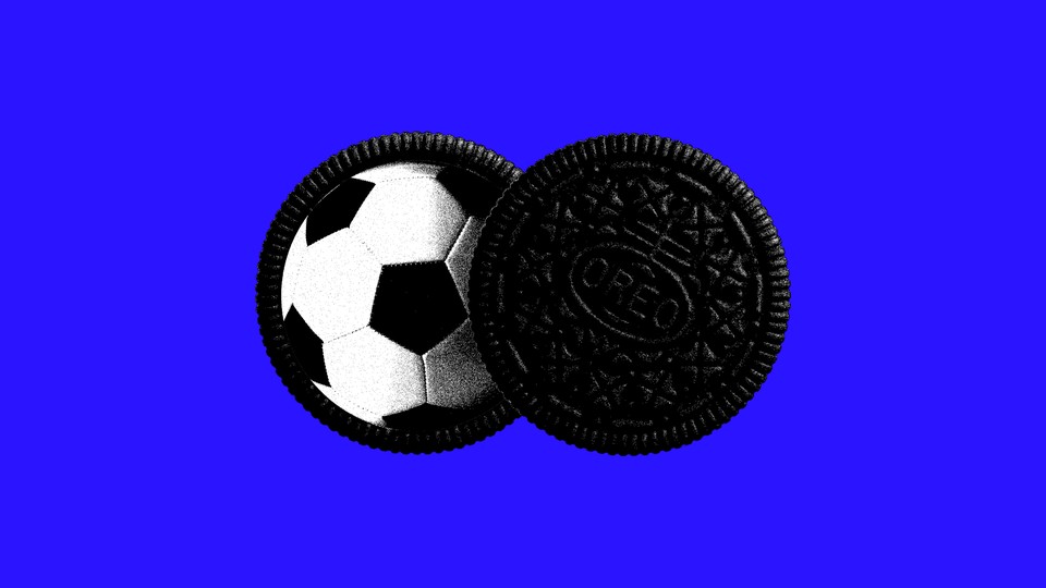 An image of a soccer ball as the filling of a Nabisco Oreo cookie