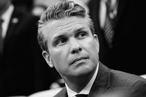 A black and white photograph of Pete Hegseth