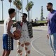 Jabari Banks as Will and Jordan L. Jones as Jazz on a basketball court