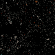A sphere of small particles expands and contracts against a black background.