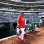 Washington Nationals' Dusty Baker walks on the field during practice at Nationals Park