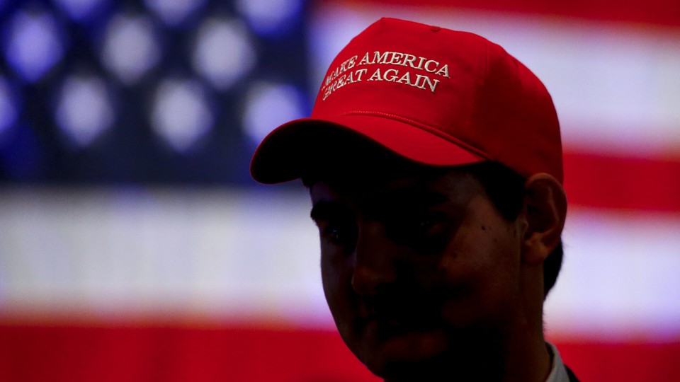 Man wearing MAGA hat