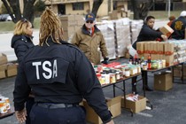 Princess Young, a Transportation Security Administration employee, visits a food pantry for furloughed government workers last week in Baltimore.