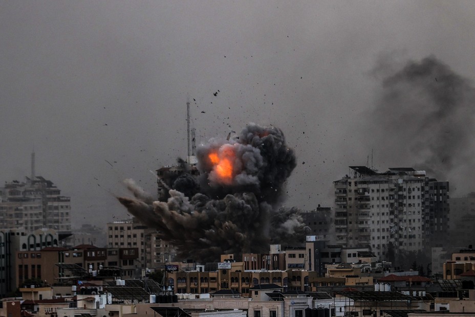 Picture of smoke rising over the buildings as the Israeli airstrikes continue in Al-Rimal Neighbourhood of Gaza City.