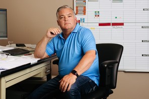 A photograph of Todd Warner in his office