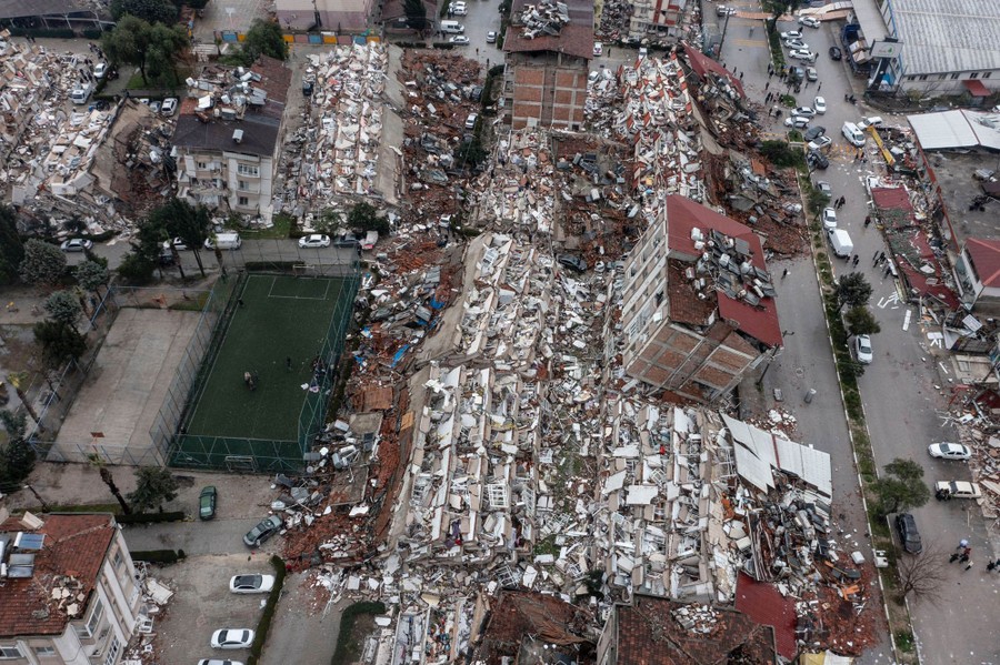 An aerial shot of several collapsed buildings