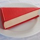 A book in the shape of a slice of cake