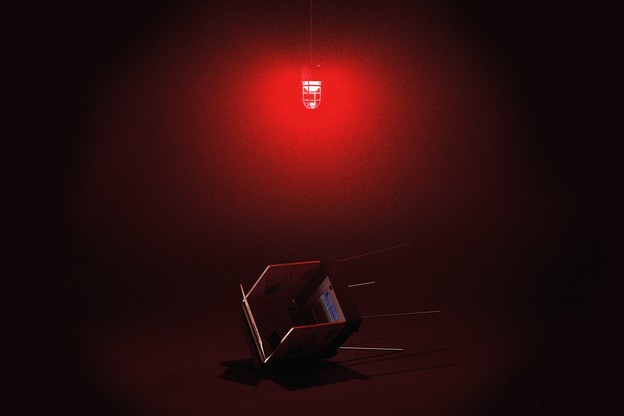 Fallen voting booth with red emergency light