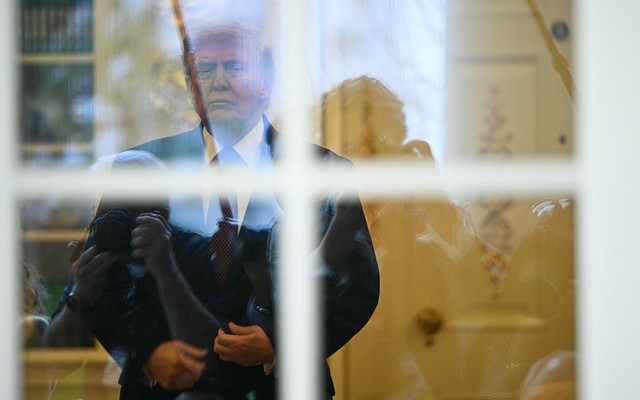 Trump reflection from window