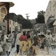 archival photo collage of black Juneteenth celebrants in a historic New Orleans background