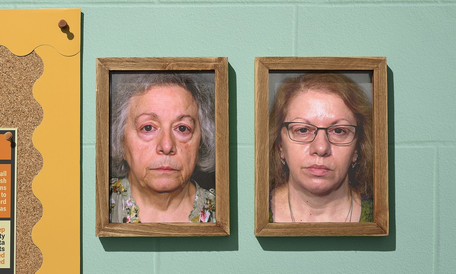 Framed photos of two women on a teal background