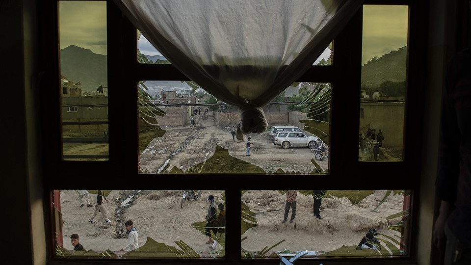 A broken window of a school in Afghanistan