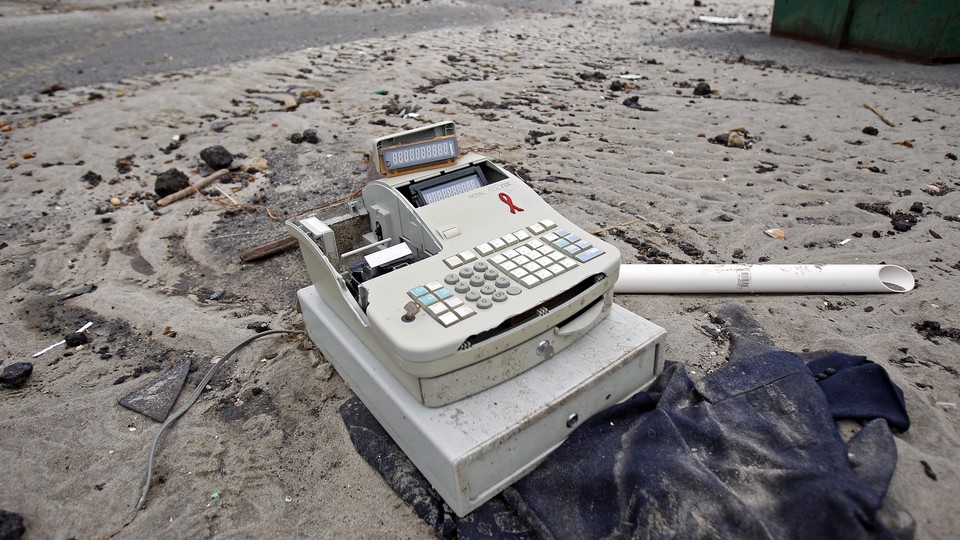 A cash register among debris