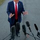 A news photo of President Donald Trump addressing members of the press