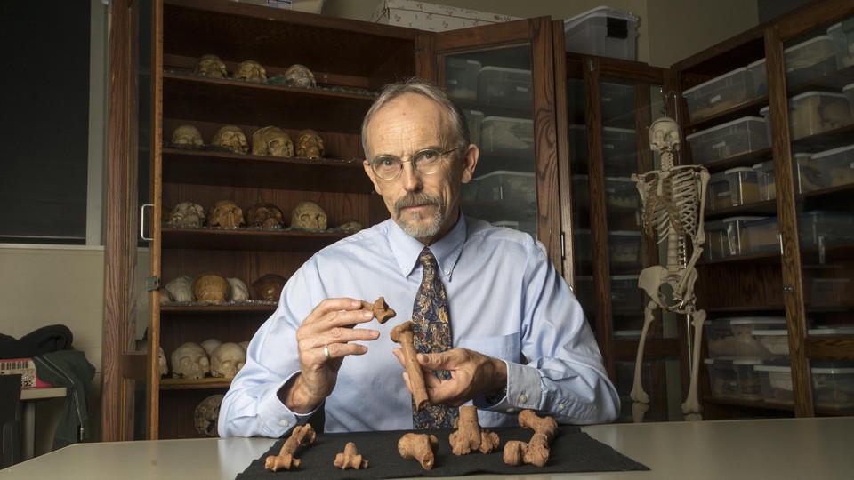John Kappelman with 3D printouts of Lucy’s skeleton