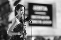 Michelle Yeoh accepting her Golden Globe