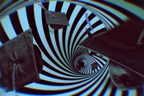 Illustration of spiraling graduation caps