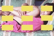 A grid of yellow rectangles superimposed over a photo of a girl hugging her legs on a couch