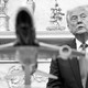 A black-and-white photo of President Donald Trump and Salvadoran President Nayib Bukele meeting in the oval office.