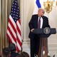 Color photograph of Benjamin Netanyahu and Donald Trump at two podiums side-by-side with American and Israeli flags in the background.