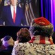 A Jewish Trump supporter is seen from behind sitting in a crowd