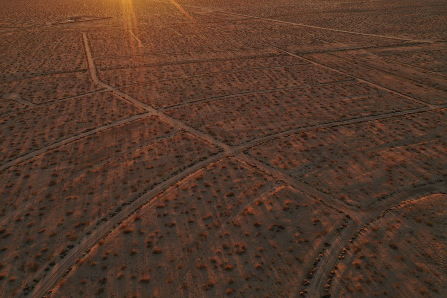 An aerial view of empty roads in a desert