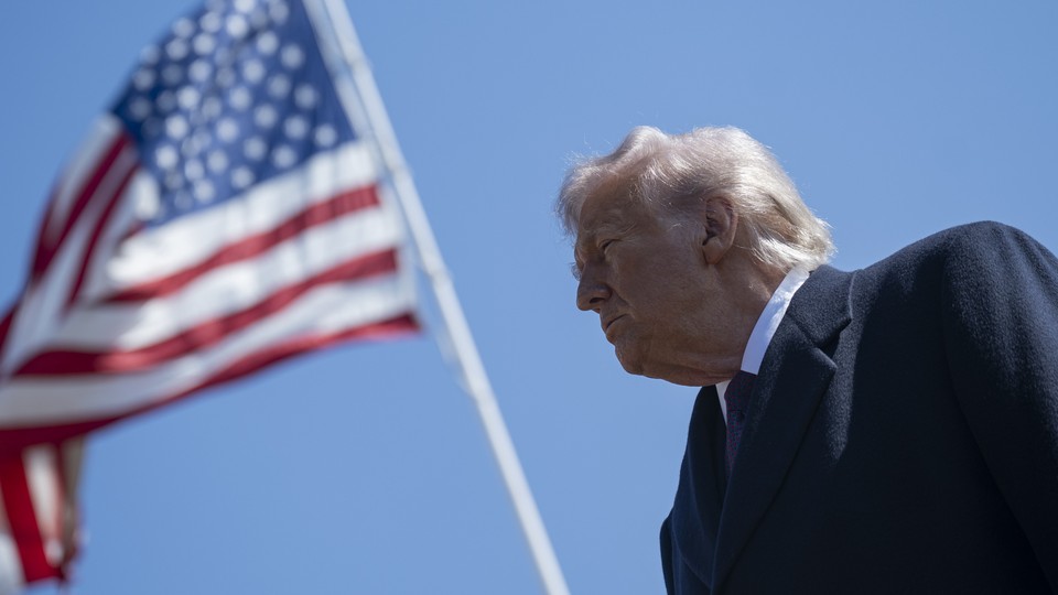 President Trump in front of an American flag