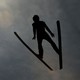 An Olympic skiier practices.