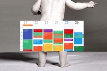 Black and white photo of a baby with a calendar covered in colored blocks superimposed