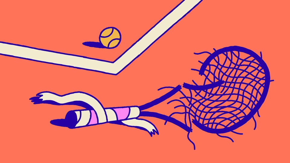 A broken, mangled tennis racket lying on the court