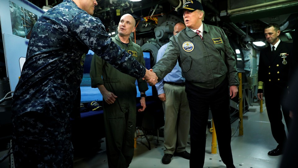 President Donald Trump tours the pre-commissioned U.S. Navy aircraft carrier Gerald R. Ford.