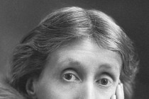 A black and white photograph portrait of Virginia Woolf in older age, cropped to just above her nose, showing her furrowed brow
