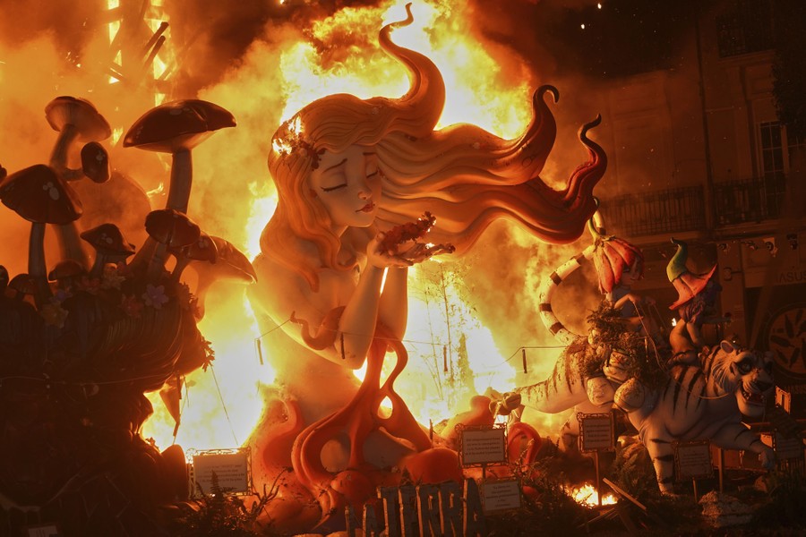 Large and intricate sculptures go up in flames during a festival.