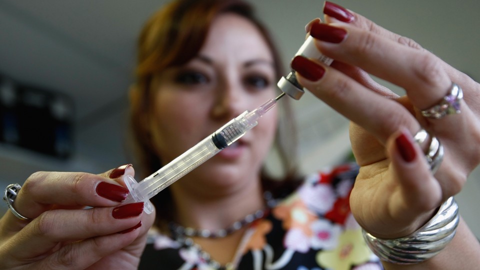 Medical assistant Elissa Ortivez draws an MMR vaccination at the Spanish Peaks Outreach Clinic on August 5, 2009 in Walsenburg, Colorado.