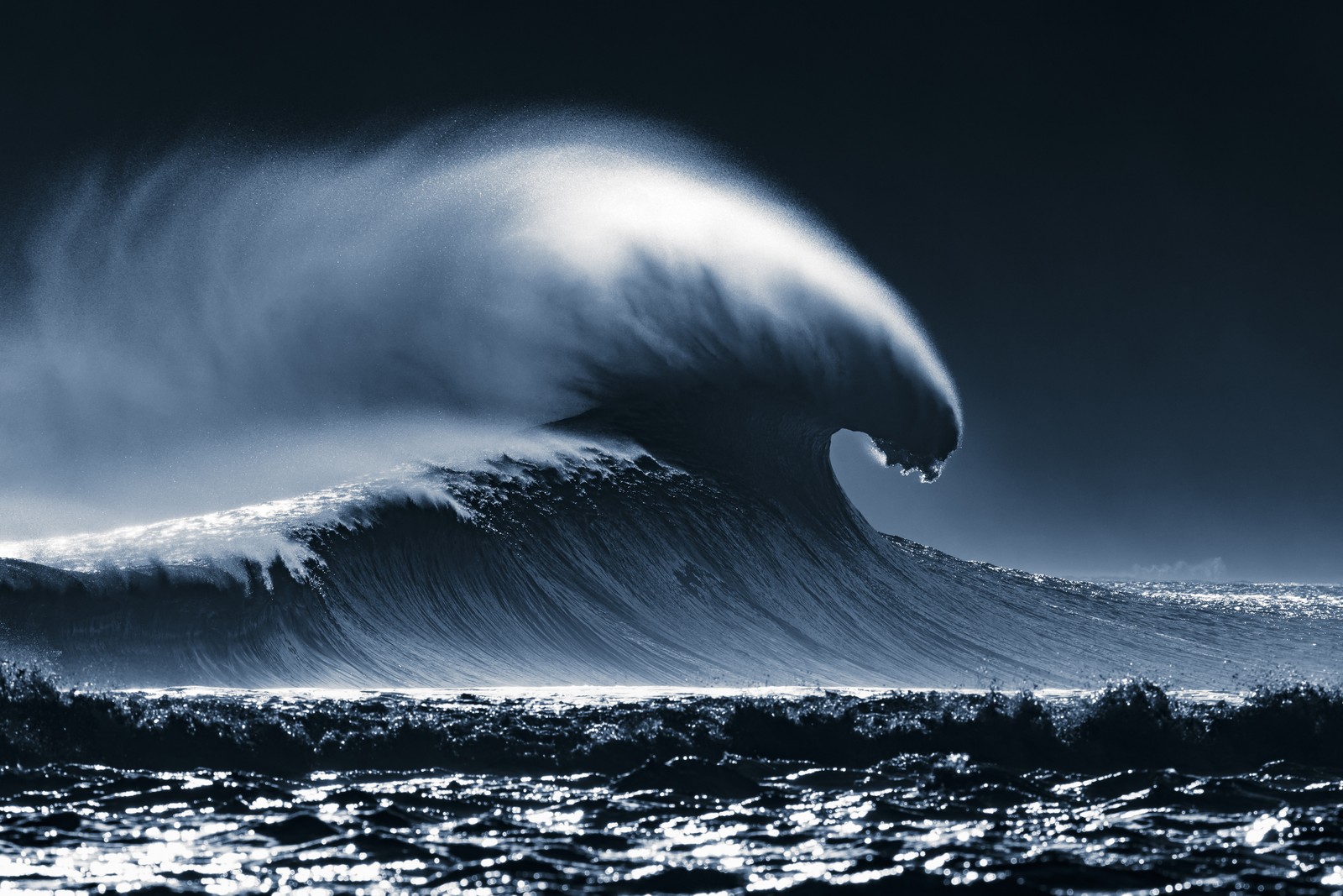 A dramatic view of a large crashing wave