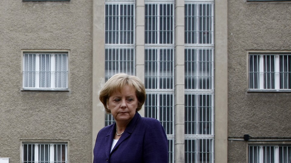 German Chancellor Angela Merkel after laying a wreath at the former prison of the East German Ministry for State Security (MfS), known as the Stasi