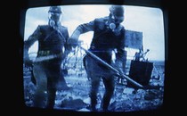 A still from a film of Chernobyl cleanup workers playing at Kyiv’s Chernobyl Museum in 2001.