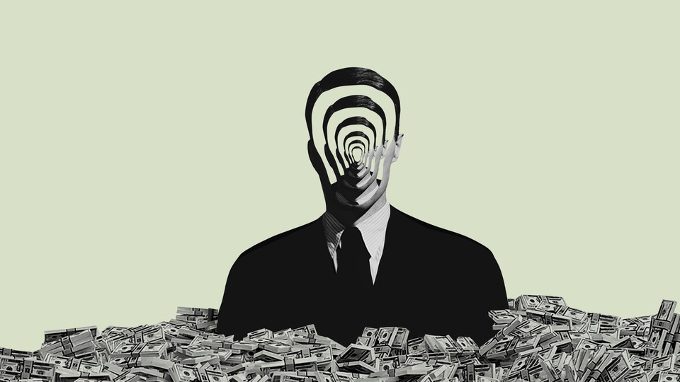 A faceless man in a suit almost shoulder deep in a pile of money