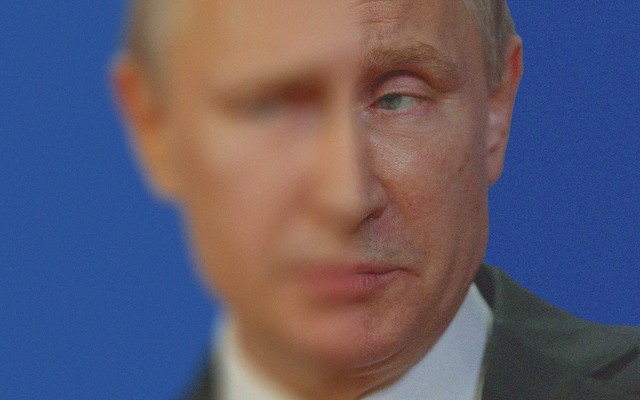 A half-blurred photo of Vladimir Putin